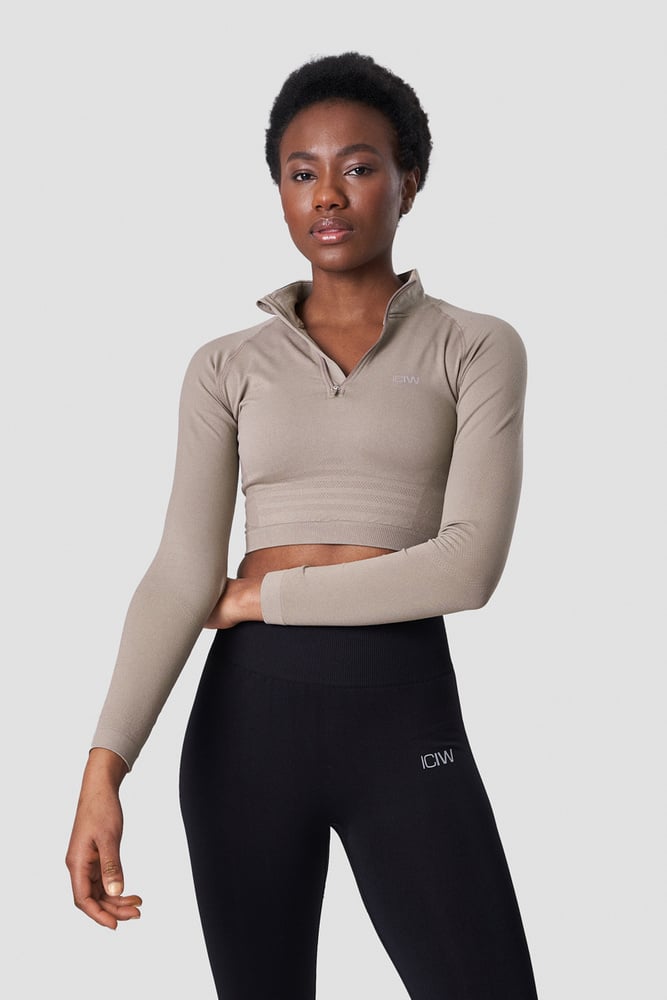 define cropped 1/4 zip taupe