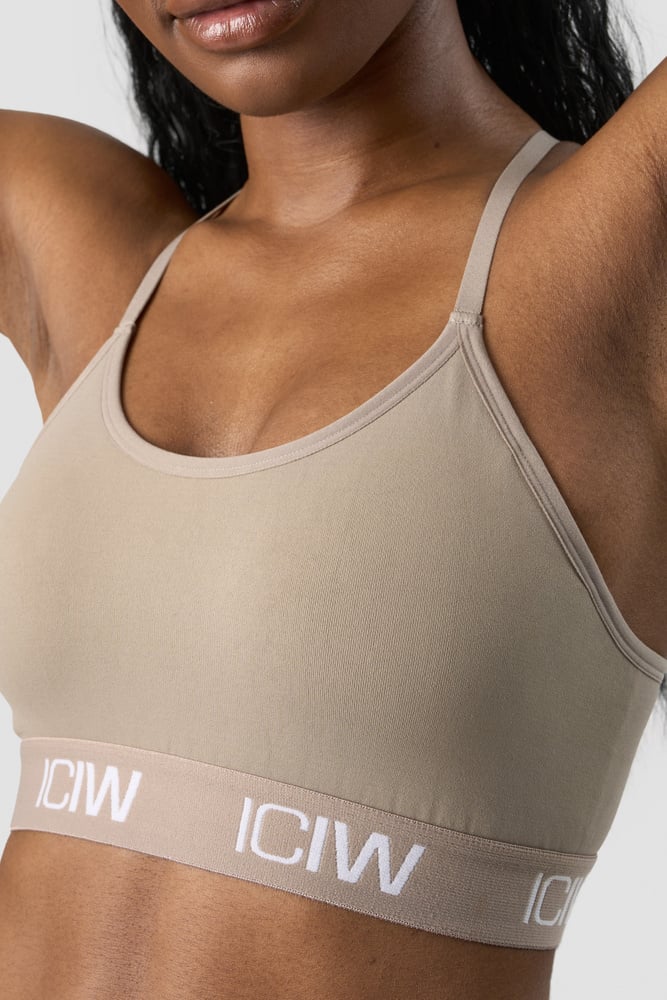 define seamless logo strappy sports bra taupe